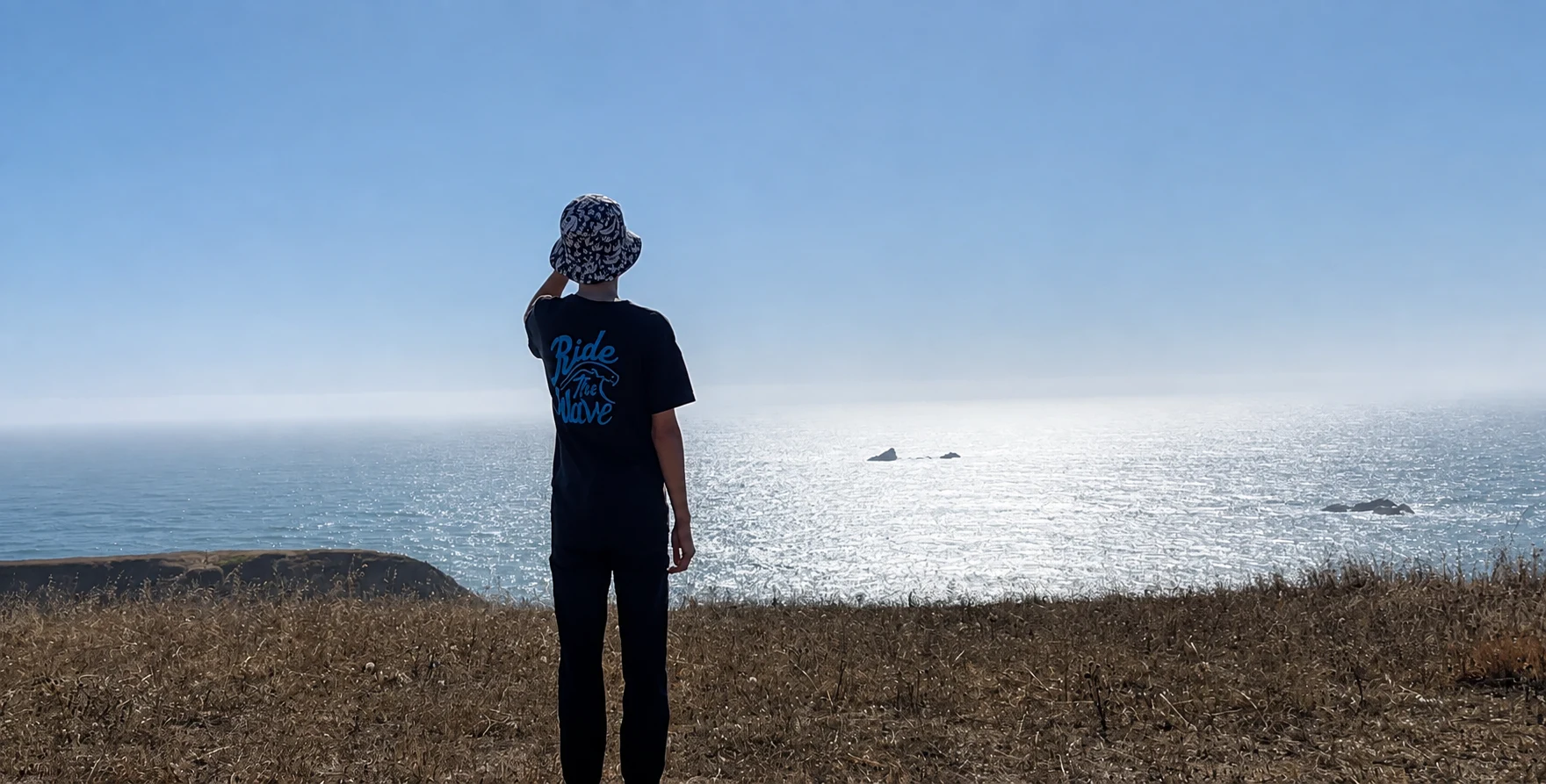A traveler looking out over the Sonoma Coast