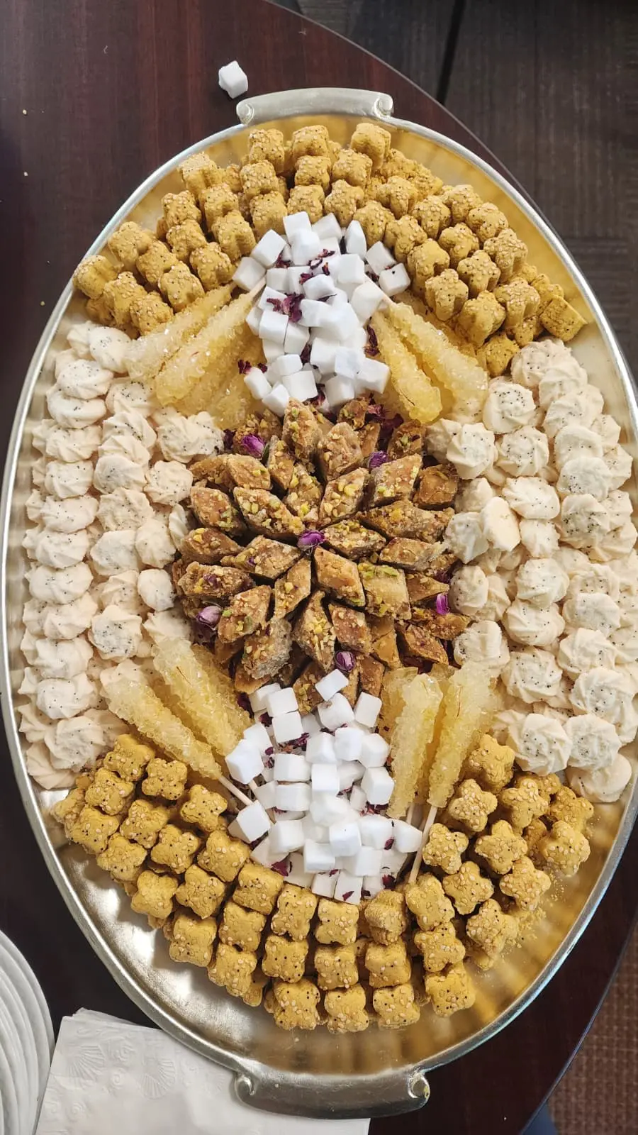 A large Persian dessert tray prepared for a catered gathering