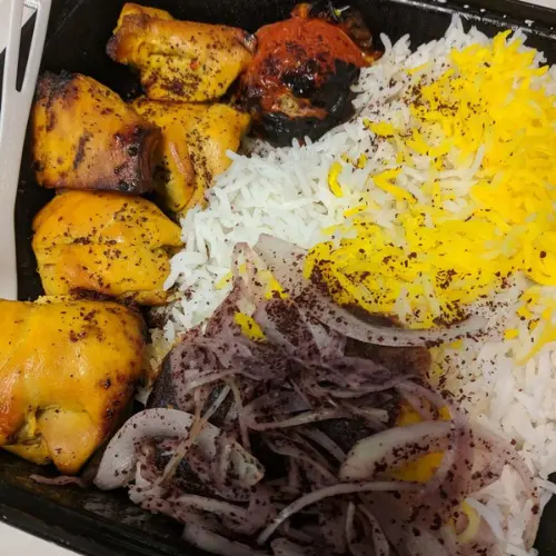 Joojeh chicken kabob with rice at Saffron Grill and Market