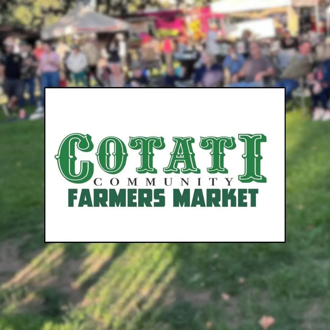 Market tents and shoppers at Cotati Community Farmers Market