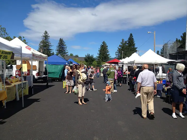 White and blue farm tents at Sonoma Valley Certified Farmers Market