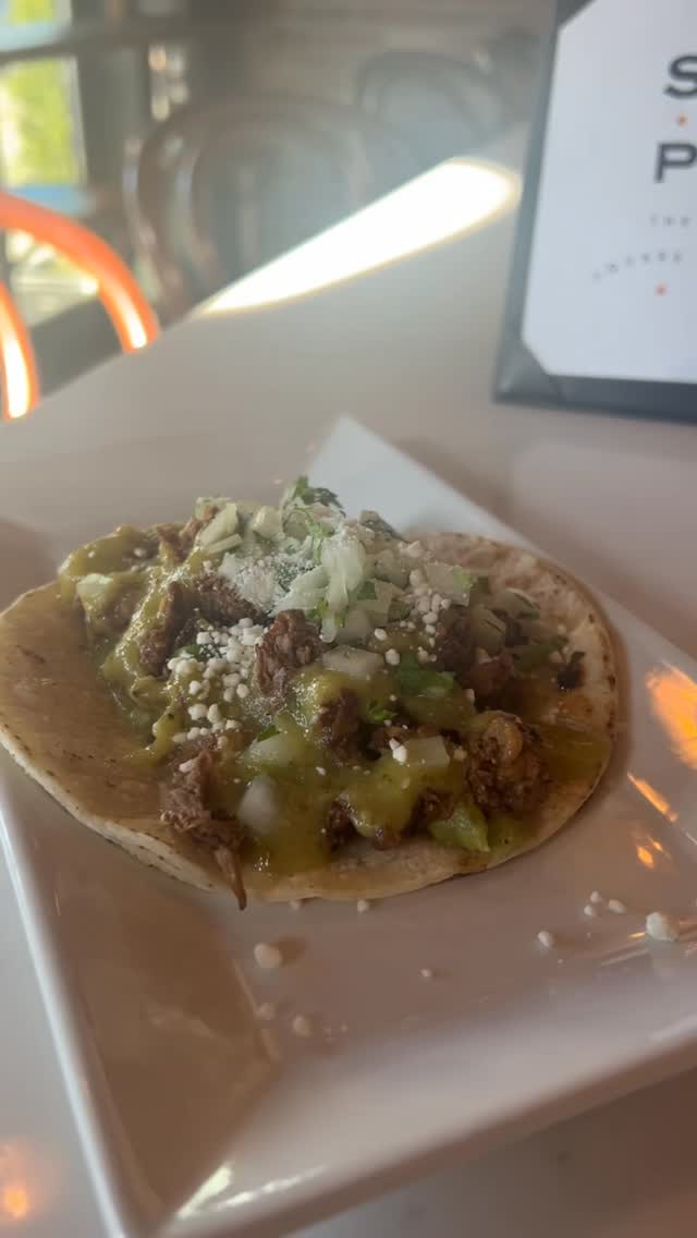 Carne asada tacos with onions, salsa verde and lime at Mi Pueblo