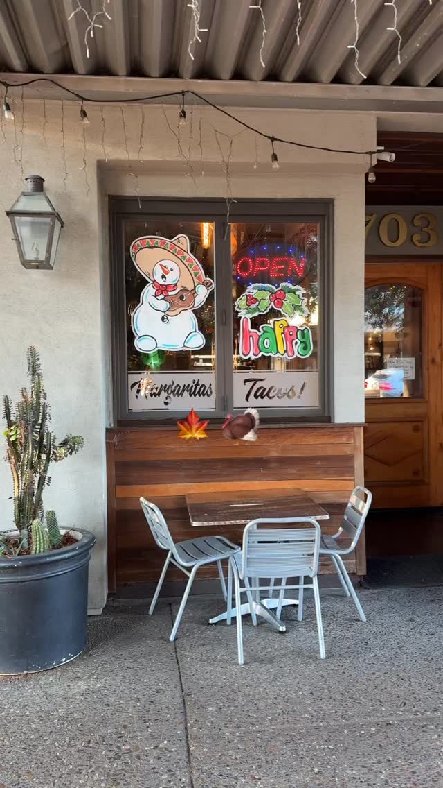 The sidewalk entrance and outdoor table at Mi Pueblo on 4th Street in downtown Santa Rosa
