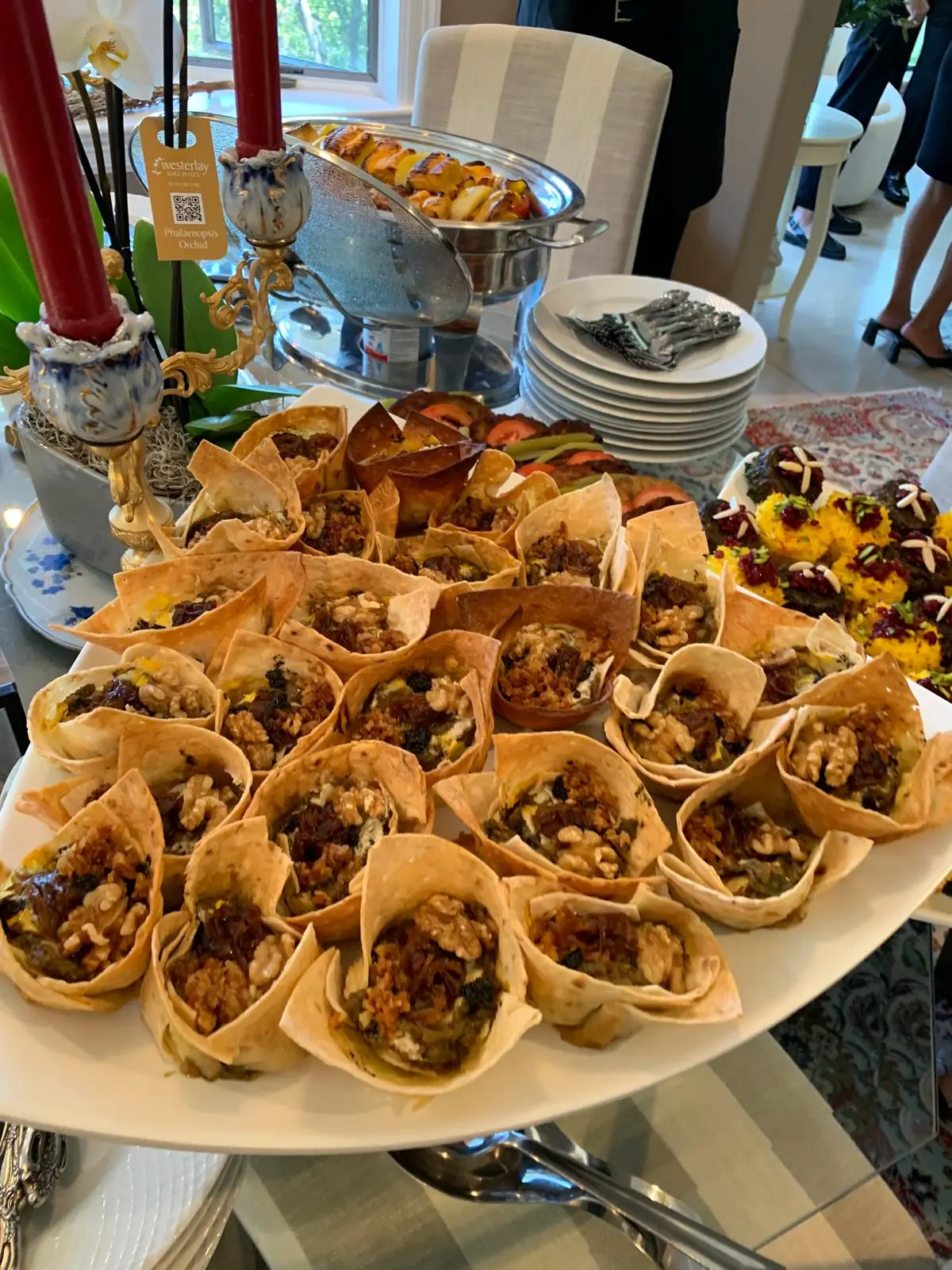 Individual Persian appetizers arranged for a catered event