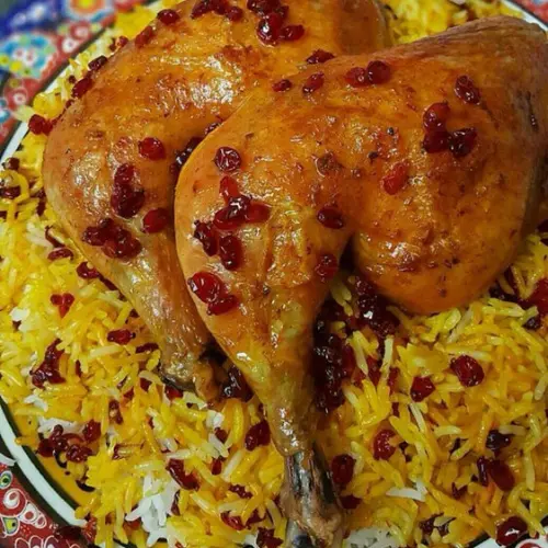Zereshk Polo Ba Morgh with saffron rice and barberries